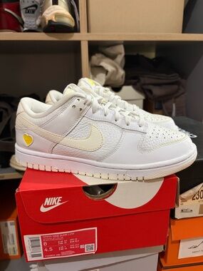 Nike White Leather Low-Top Sneakers with Cream Swoosh and Yellow Heart